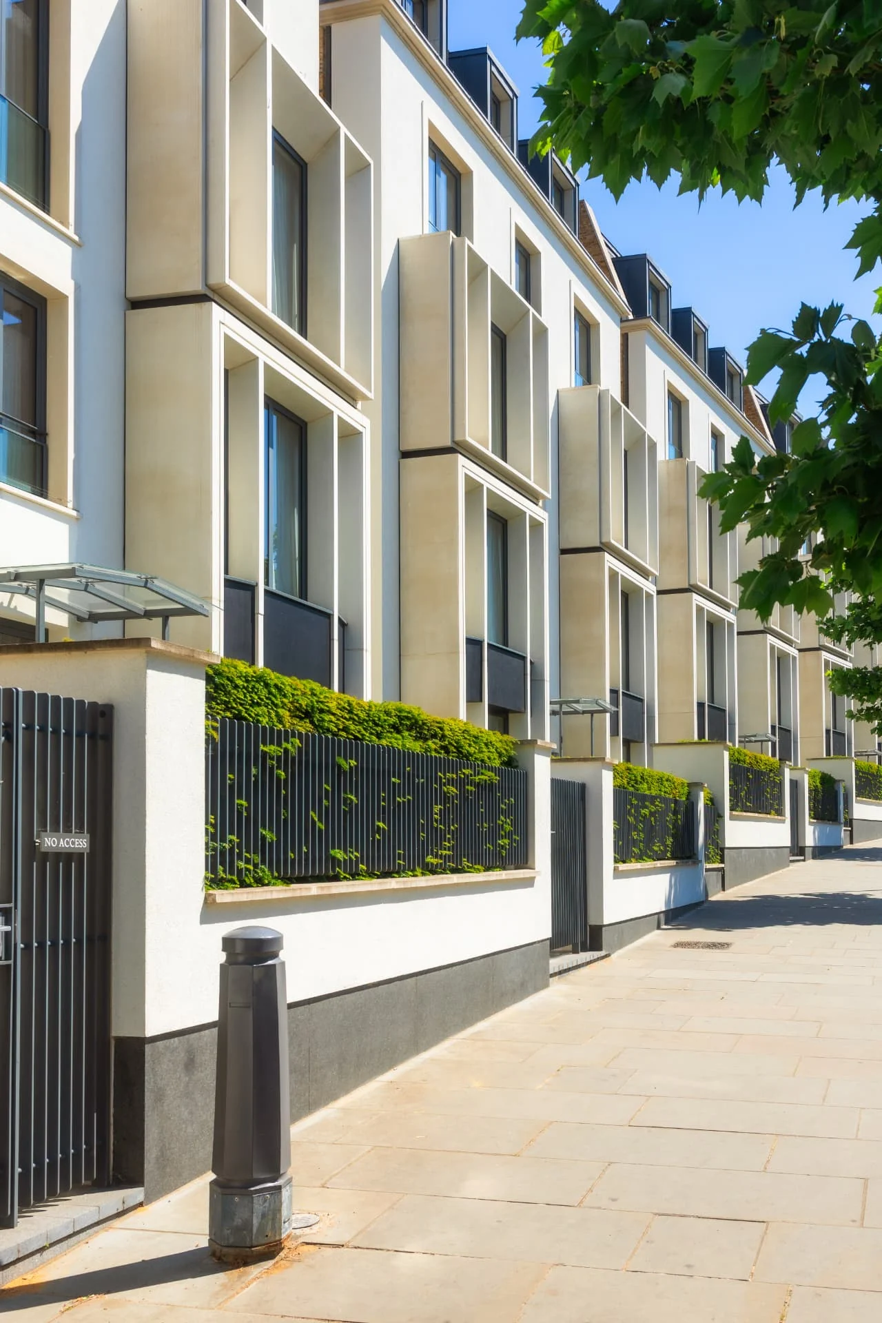 Contemporary multi-unit residential development with landscaped frontage and shared access