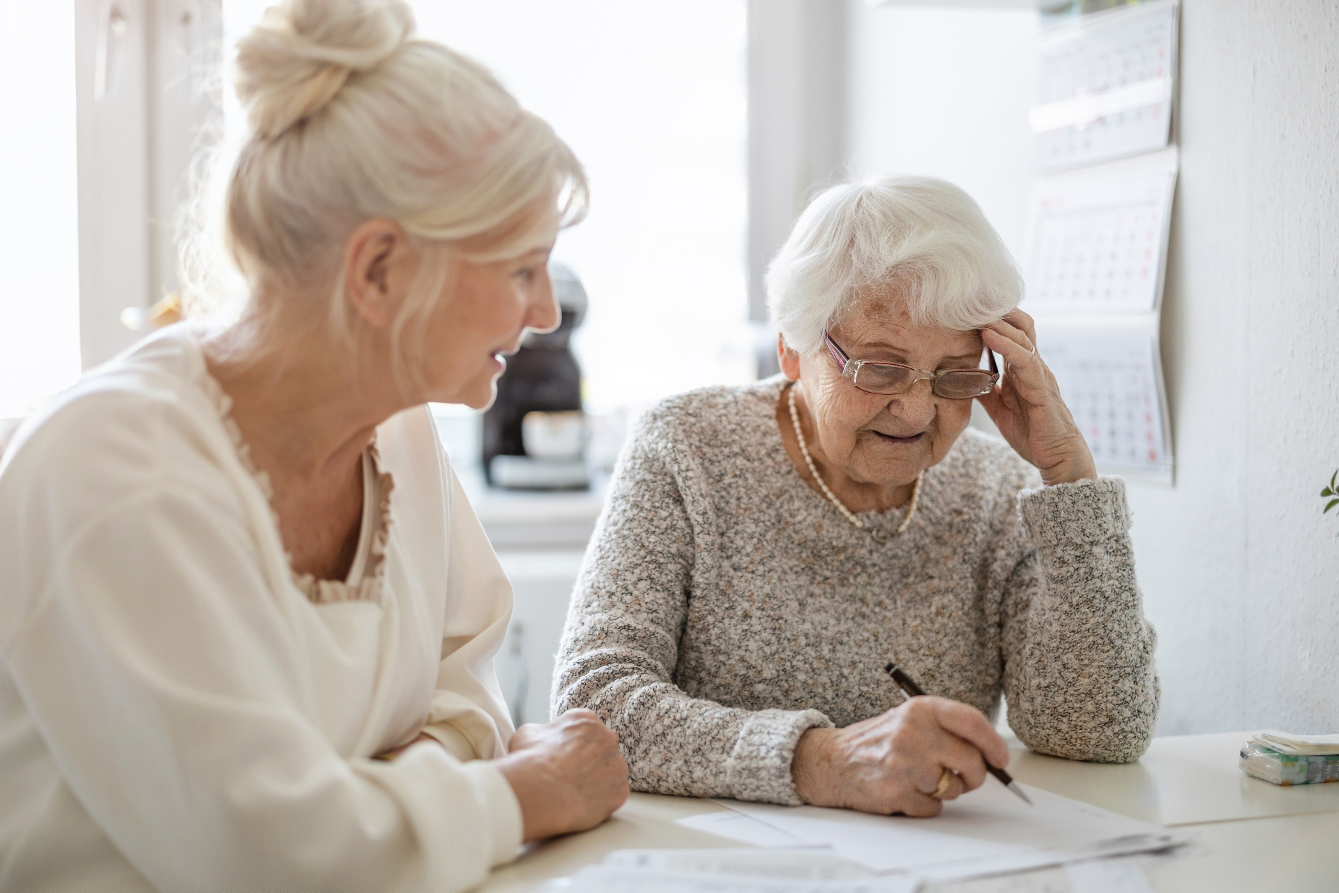 Family reviewing an aged care resident agreement before signing