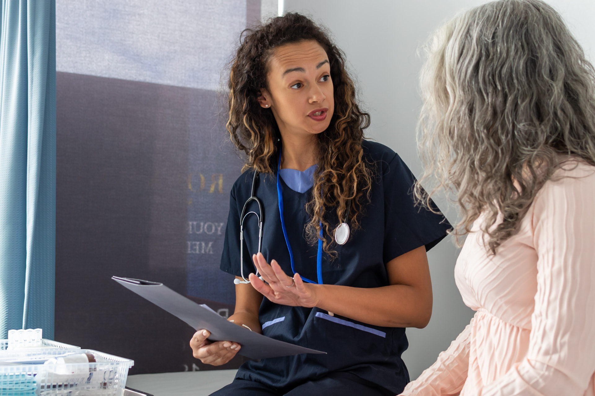 Older adult discussing an advance care directive with a medical practitioner