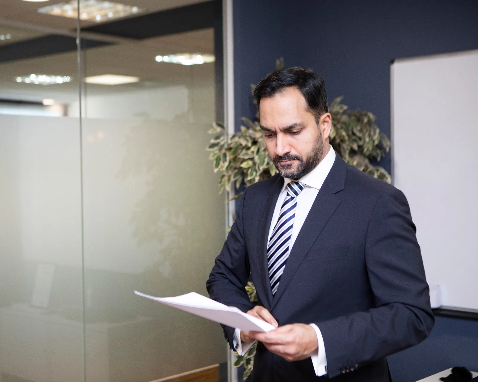 Lawyer reviewing a brief in preparation for a Magistrates' Court matter