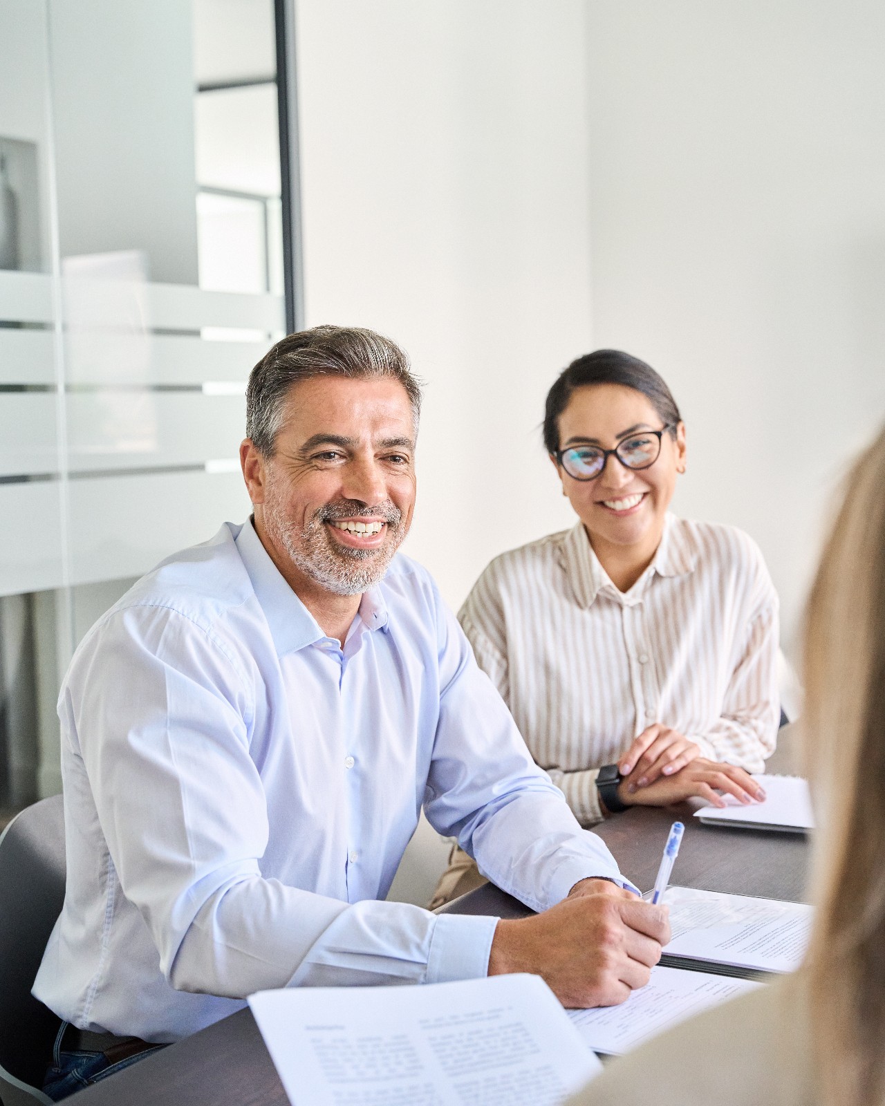 Clients discussing superannuation and SMSF succession documents with advisers