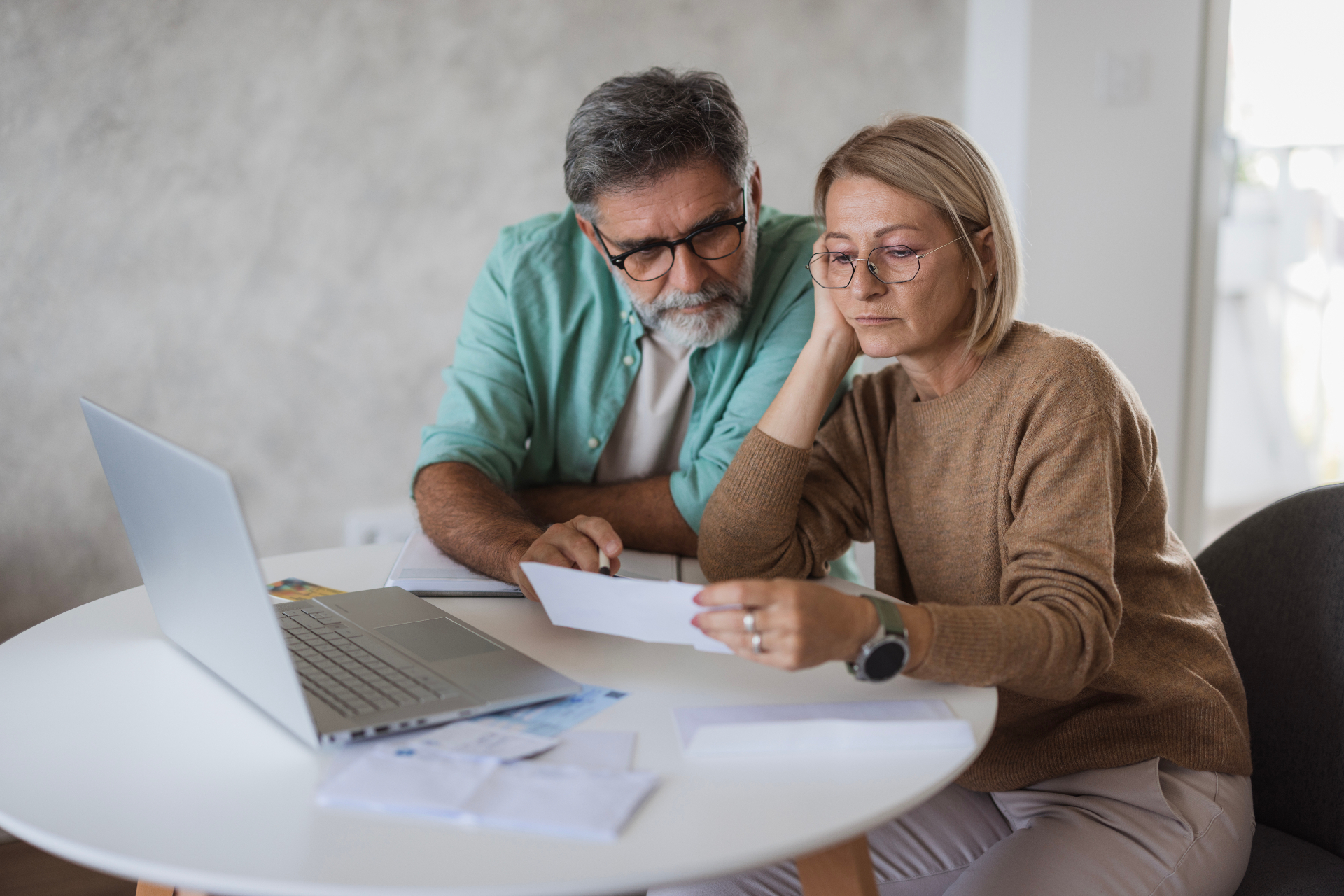 An executor reviews an estate distribution schedule with a solicitor — statutory protection under section 33 Trustee Act