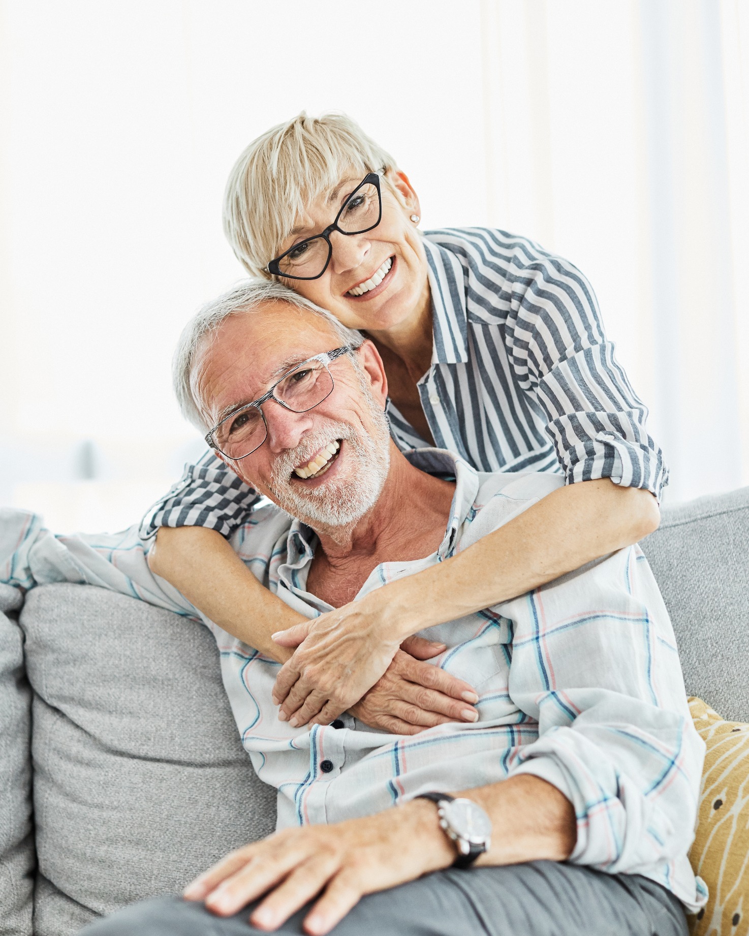 Older couple at home considering powers of attorney and elder law planning